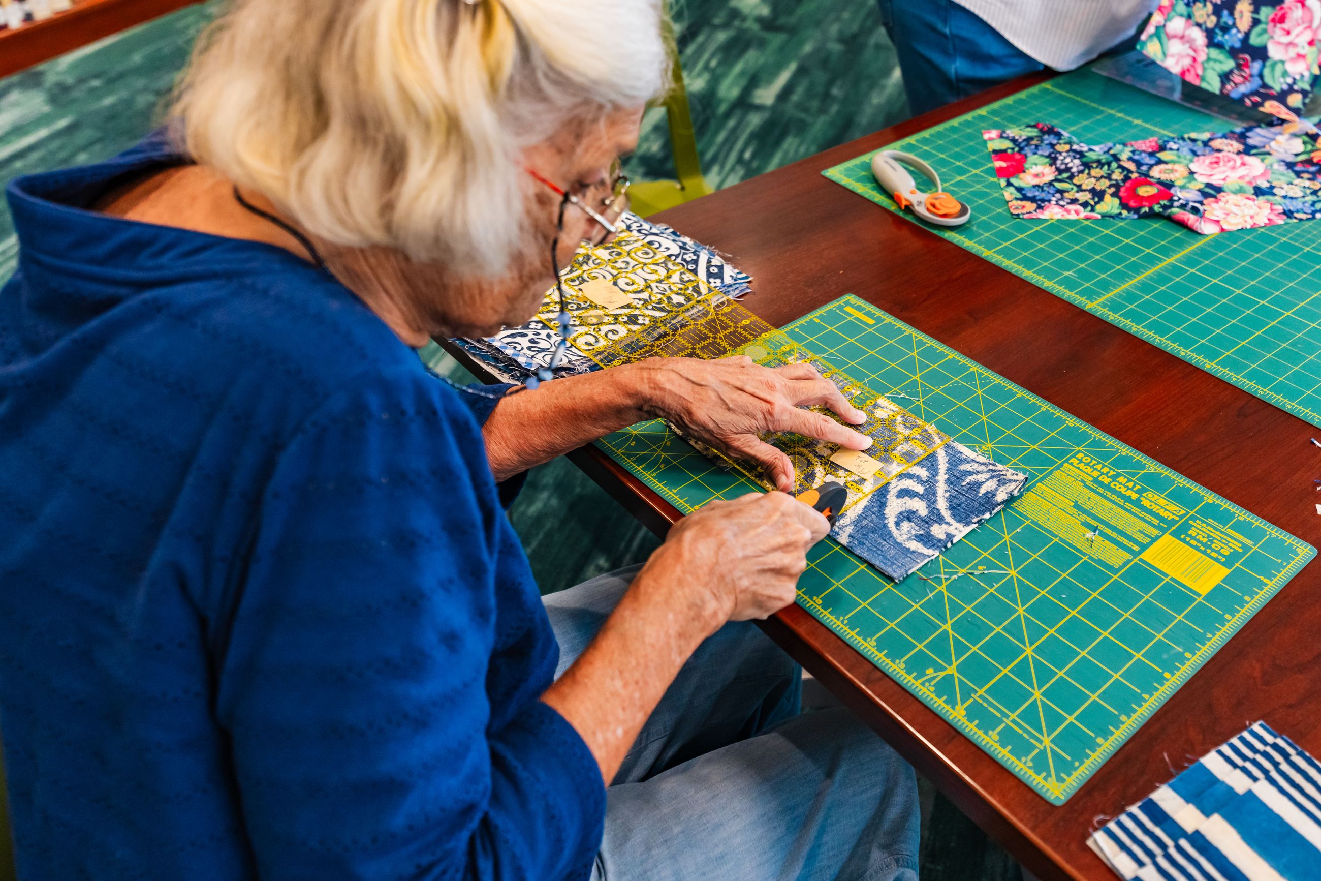 Woman quilting/sewing