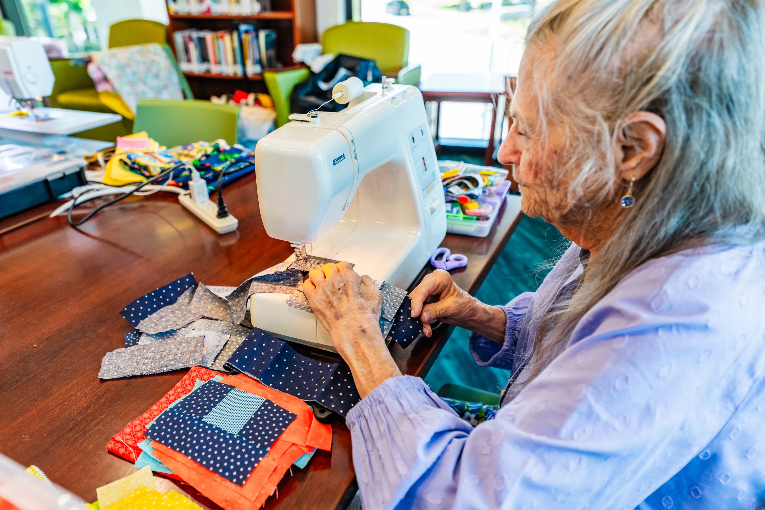 Woman quilting/sewing